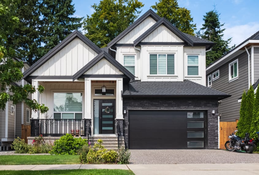 Exterior of a contemporary black-and-white suburban house